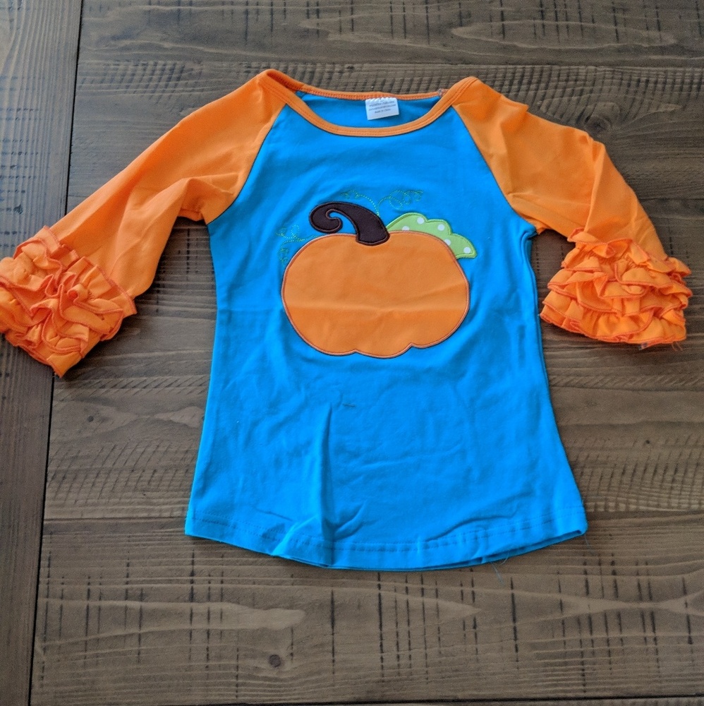 Toddler pumpkin shirt.